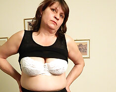 Horny Mature Slut Masturbating On The Couch