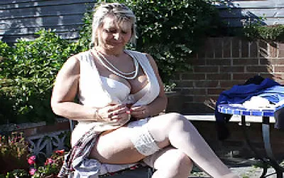 Big Breasted Mature Slut Playing In The Garden