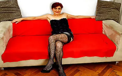 Horny Mature Lady Masturbating On Her Couch