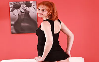 Naughty Housewife Masturbating On The Couch